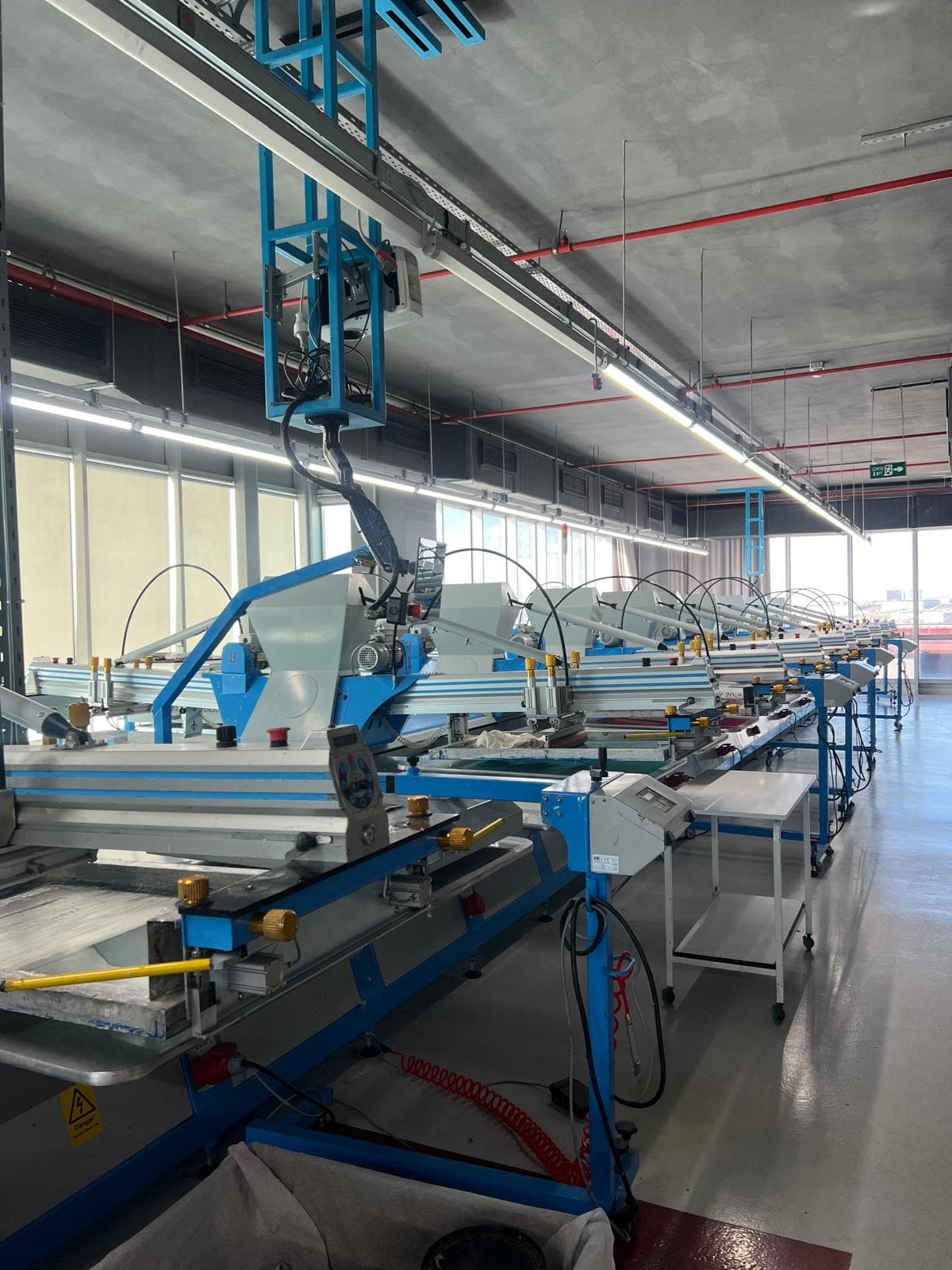 Textile print production line on the factory floor